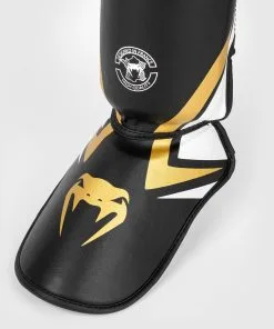Venum Contender 2.0 Shinguard -Training gear shop 073f4502ef9eca060cc17d6de76650c899719366 SHINGUARDS CONTENDER2.0 BLACK WHITE GOLD 03
