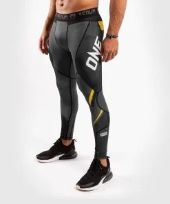 Venum One FC Impact Compression Tights - Grey-Yellow -Training gear shop 0eb30a44f12b92f6558e3abe8823a99714a3407c SPATS ONEFC IMPACT GREY YELLOW 01