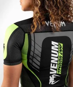 Venum Training Camp 3.0 Women's Rashguard Short Sleeves 13 Venum Training Camp 3.0 Women's Rashguard Short Sleeves -Training gear shop 11a7cec27481a119cb5d120037a8e2480489fd45 RASH SS VTC3 BLACK NEOYELLOW 06