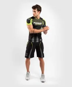 Venum Training Camp 3.0 Rashguard Short Sleeves 15 Venum Training Camp 3.0 Rashguard Short Sleeves -Training gear shop 1e93bd0435d6a9bfce606e26529621d7c057ca3c RASH SS VTC3.0 BLACK NEOYELLOW 09
