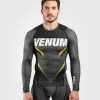 Venum One FC Impact Rashguard - Long Sleeves - Grey-Yellow -Training gear shop 32594a5ca97eb2f65989f555a99dc6adbb933463 RASH LS ONEFC IMPACT GREY YELLOW 01