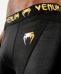Venum GFit Spats, Black/gold -Training gear shop 3582074eac58d53d91a206cf576552f4045e6ad3 SPATS GFIT BLACK GOLD SD 06