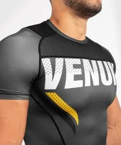 Venum One FC Impact Rashguard - Short Sleeves - Grey-Yellow -Training gear shop 46bdfcc91f56cc36faf7617b2fa02c4c6cadbe58 RASH SS ONEFC IMPACT GREY YELLOW 05