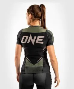 Venum ONE FC Impact Rashguard Short Sleeves Women - Black-Khaki -Training gear shop 517b1681efc8c508b5f9f55a50975c87e4fa83bc RASH SS ONEFC BLACK KHAKI 05