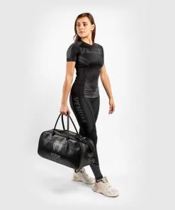 Venum ONE FC Impact Rashguard Short Sleeves Women - Black-Black -Training gear shop 5599087ad6eaf7a0388ebd1a83ee58ac45a850a7 RASH SS ONEFC BLACK BLACK 08