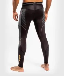 Venum Athletics Compression Tights - Black-Gold 10 Venum Athletics Compression Tights - Black-Gold -Training gear shop 59fc7a6106a30a36e2b36010daf3565dbb4aa450 SPATS ATHLETICS BLACK GOLD 03 1