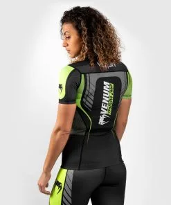 Venum Training Camp 3.0 Women's Rashguard Short Sleeves 11 Venum Training Camp 3.0 Women's Rashguard Short Sleeves -Training gear shop 787a8806e1290e244758cec30fc07ea5c85026be RASH SS VTC3 BLACK NEOYELLOW 03