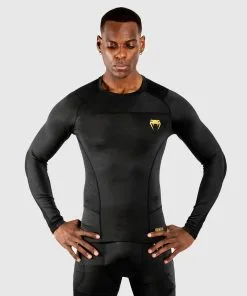 Venum GFit Rashguard - Long Sleeves Black/Gold -Training gear shop 86fae1034c7c2c3da6b5d0da34ceb51c82685208 RASH LS GFIT BLACK GOLD SD 01