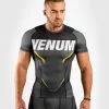 Venum One FC Impact Rashguard - Short Sleeves - Grey-Yellow 2 Venum One FC Impact Rashguard - Short Sleeves - Grey-Yellow -Training gear shop 90f829e0a3d3b2c5e0dd12ae466b09f2b9b96cc8 RASH SS ONEFC IMPACT GREY YELLOW 01