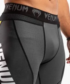 Venum One FC Impact Compression Tights - Grey-Yellow -Training gear shop 91358c24aa15e950db6ec3f4b3d8db6c884ab97b SPATS ONEFC IMPACT GREY YELLOW 06