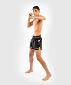Venum Parachute Muay Thai Shorts - Black-Gold -Training gear shop 98bbb999aa72b1bfd9ab27da0dbe19db5b6aa7bd SHORT MUAYTHAI PARACHUTE BLACK GOLD 10