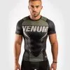 Venum One FC Impact Rashguard - Short Sleeves - Black-Khaki -Training gear shop 994bdcf2a899595e97c9261ac7038027e8e47138 RASH SS ONEFC IMPACT BLACK KHAKI 01