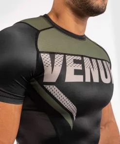 Venum One FC Impact Rashguard - Short Sleeves - Black-Khaki -Training gear shop 9cdb5f516847e8b56fe37be99270c10030c8c28f RASH SS ONEFC IMPACT BLACK KHAKI 05