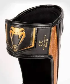 Venum Elite Evo Shinguards - Black/Bronze -Training gear shop Venum20Elite20Evo20sC3A4C3A4risuojat20Musta Pronssi206