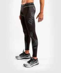 Venum One FC Impact Compression Tights - Black-Black -Training gear shop a2151e6c89d11921cf0d1d1bdf76c990e7b1f418 SPATS ONEFC IMPACT BLACK BLACK 02