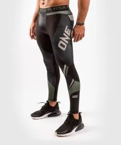 Venum One FC Impact Compression Tights - Black-Khaki 11 Venum One FC Impact Compression Tights - Black-Khaki -Training gear shop a638d0188d930a660d379f0be4222fc3f5cb623b SPATS ONEFC IMPACT BLACK KHAKI 02