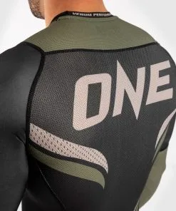 Venum One FC Impact Rashguard - Long Sleeves - Black-Khaki -Training gear shop a6db1d3f38bffd5feea7a58d9904db39b34ad2ce RASH LS ONEFC IMPACT BLACK KHAKI 06