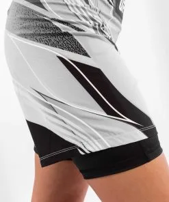 UFC Venum Authentic Fight Night Women's Shorts - Long Fit - White 15 UFC Venum Authentic Fight Night Women's Shorts - Long Fit - White -Training gear shop c6ce8376fc9a5a3a78908883640c3869aed10880 VNMUFC 00019 002 07