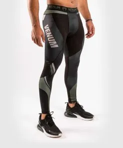 Venum One FC Impact Compression Tights - Black-Khaki 12 Venum One FC Impact Compression Tights - Black-Khaki -Training gear shop d56d54340561bb9a10f1e3229901749659c812b2 SPATS ONEFC IMPACT BLACK KHAKI 05
