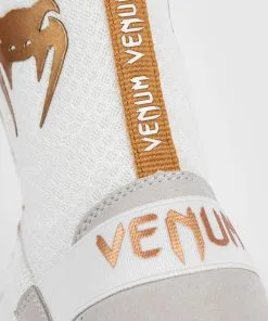 Venum Elite Boxing Shoes (23), White-Gold -Training gear shop ded185c2c47702f563ae7f0007b2b7301ebabde9 BOXING SHOES ELITE WHITE GOLD 10